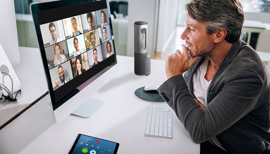 man talking to zoom participants on computer screen